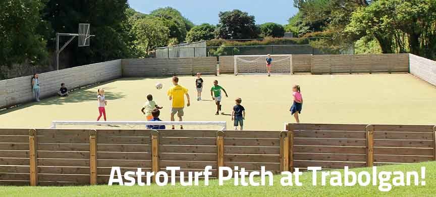 Children playing on the AstroTurf page at Trabolgan Holiday Village